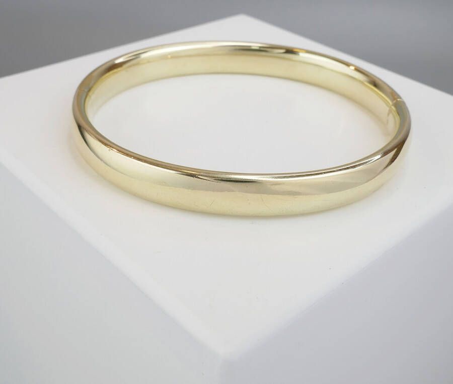 Casio 14 karaat ocn gouden slavenarmband