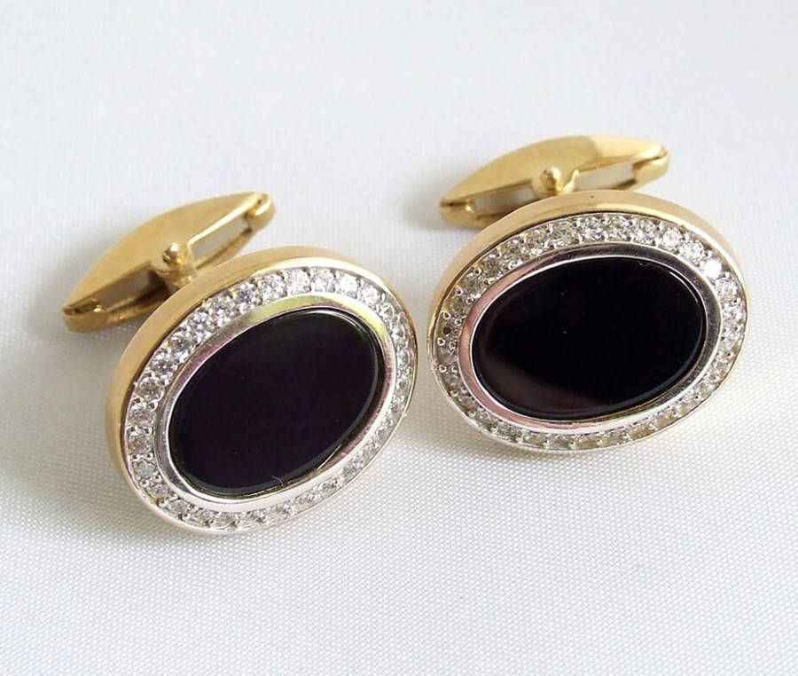Christian Gouden manchetknopen met onyx en diamanten